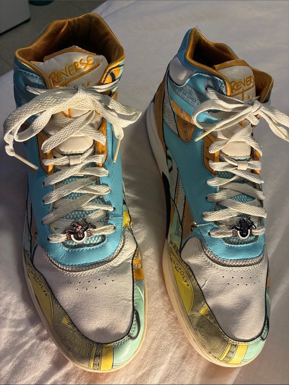 Reebok Reverse Jam Monopoly Men’s Mid-Top Sneakers in Light Blue,White,Peach